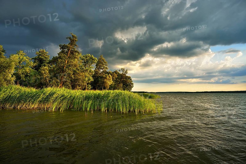 Thunderstorm clouds over Lake Scharmutzelsee