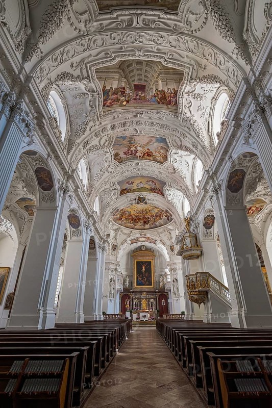 Interior view with chancel and ceiling frescoes and stucco