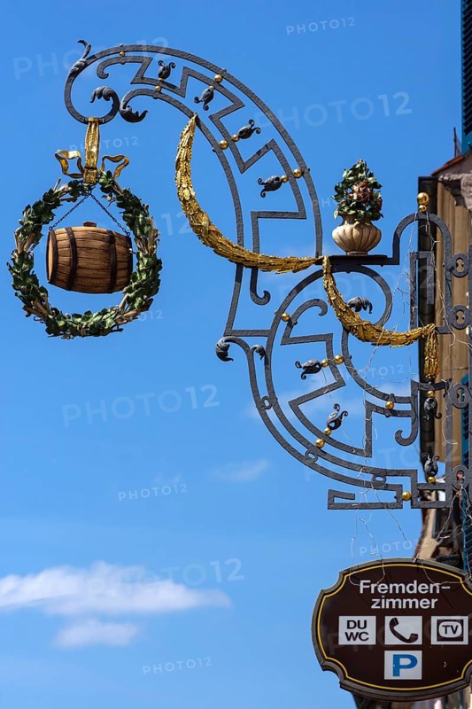 Hanging shop sign with a beer barrel