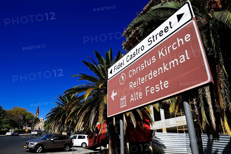 Sign Christ Church and Fidel Castro street with a view of the church