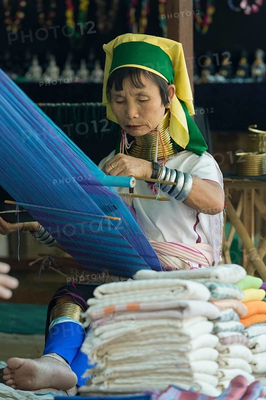 Padaung or long neck woman weaving