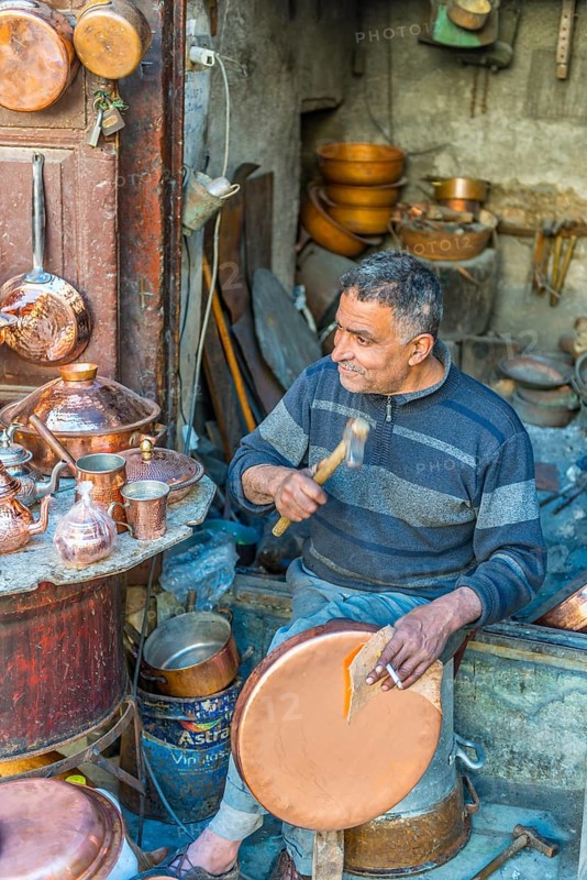 Coppersmith at work