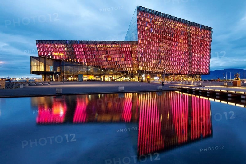 Illuminated Harpa Concert Hall at dusk