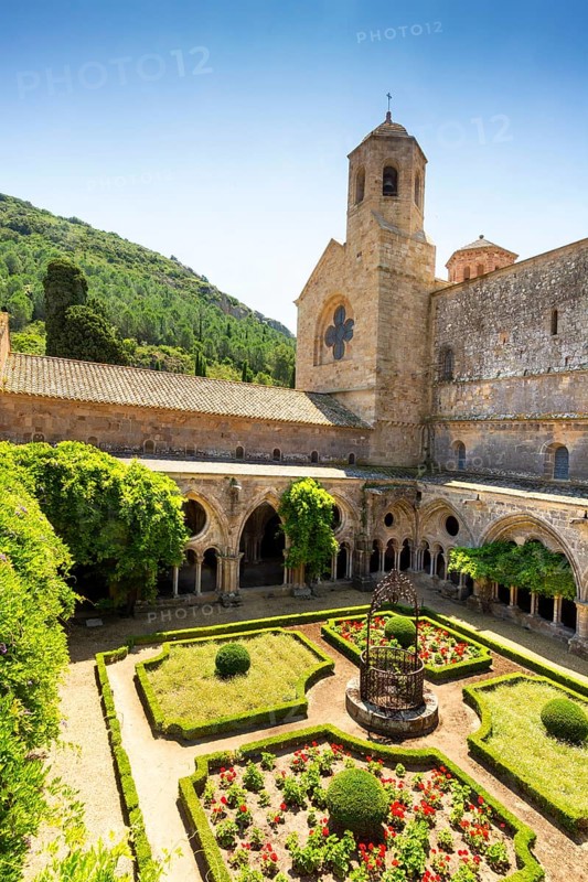 Cloister and well at the Abbaye Sainte-Marie de Fontfroide or Fontfroide Abbey near Narbonne