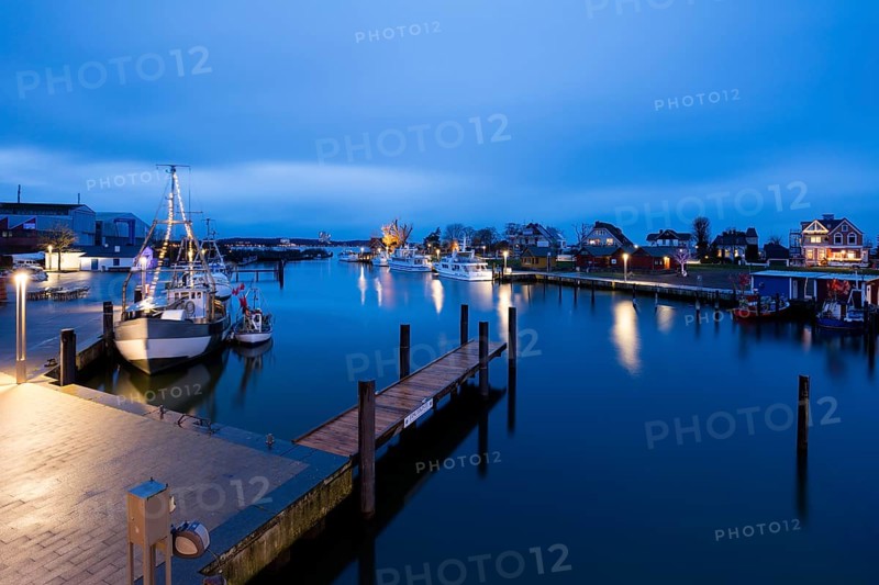 Baltic Sea harbour with boats at dusk