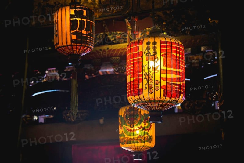 Traditional Chinese lanterns hanging from the ceiling