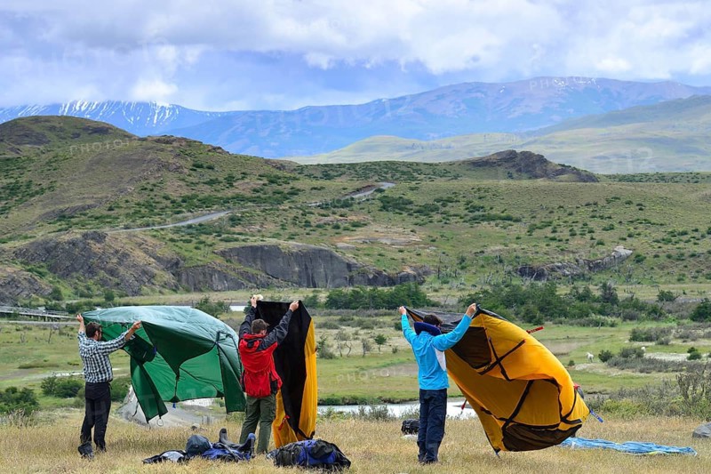Tourists drying their tent