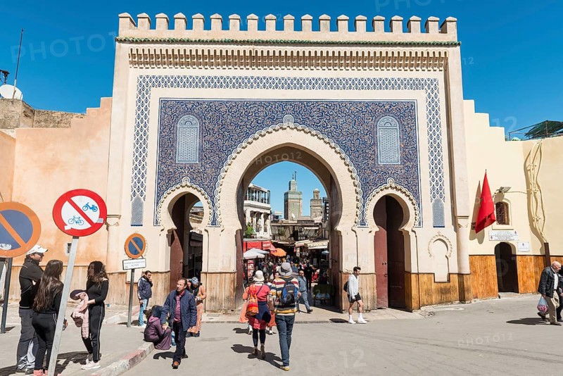 Locals and tourists in front of Bab Boujeloud