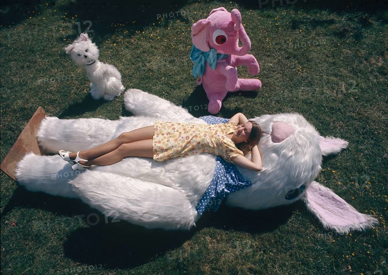 Woman with soft toys