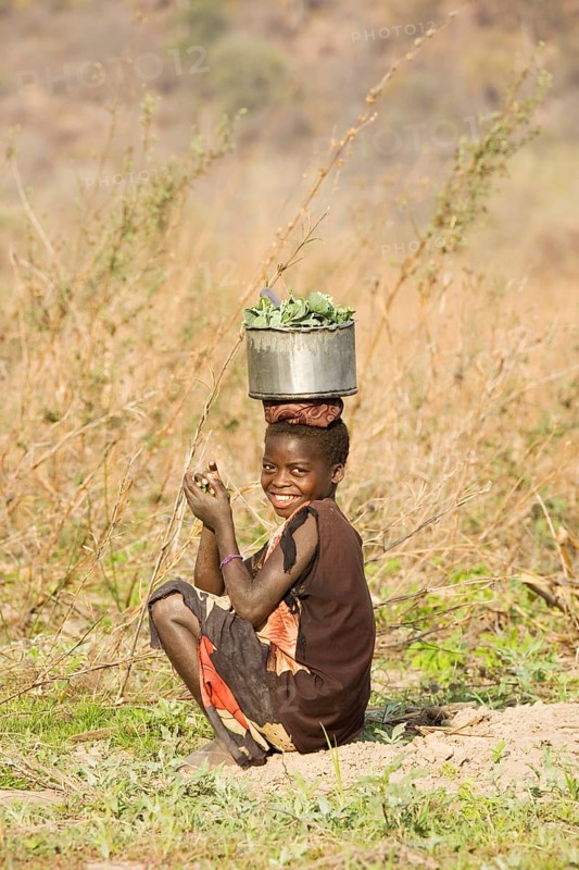 Tonga girl with vegetables