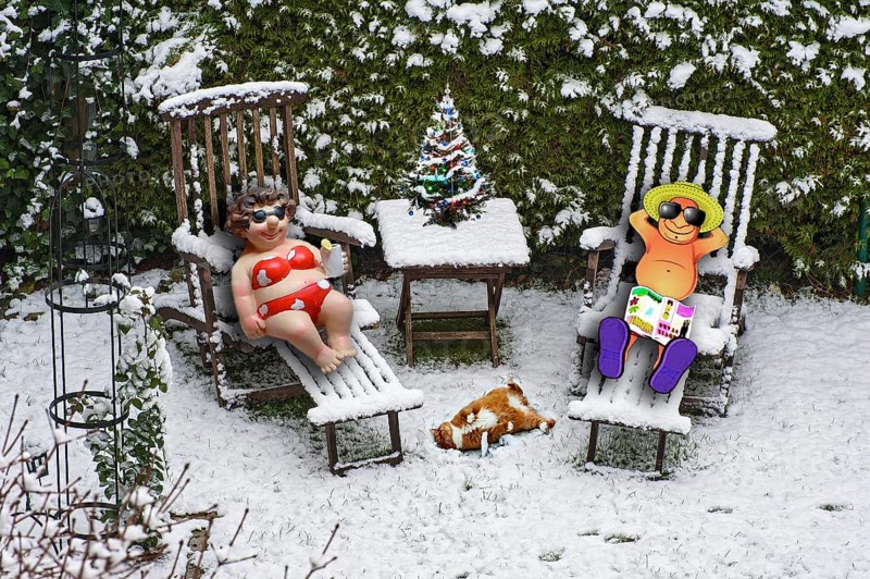 Garden chairs in snow