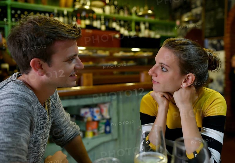 Young couple talking in Tapas Bar