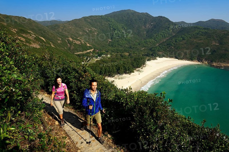 Hikers on the McLehose Trail overlooking Long Ke Beach