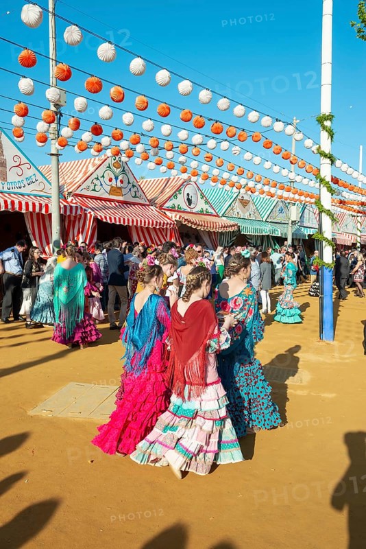 Spanish women wearing flamenco dresses