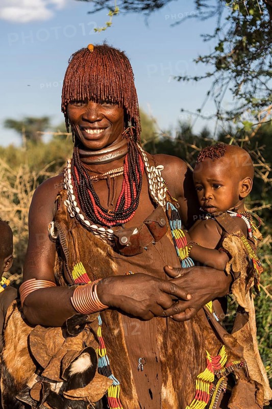 Woman with an infant in her arms