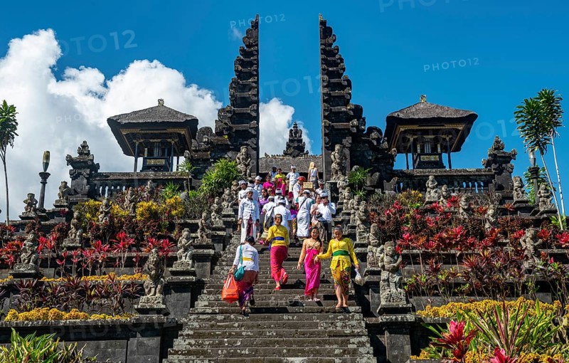 Devout Balinese descend stairs