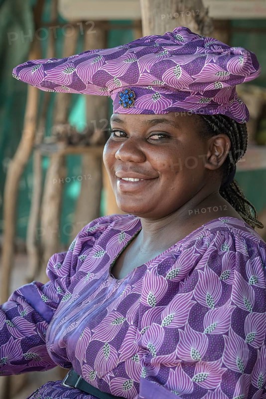 Native Herero woman with typical headgear and clothes