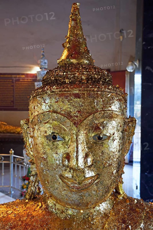 Buddha statue covered with gold leaf
