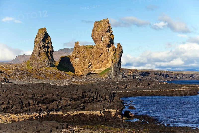 Coastal landscape with rock formation Londrangar