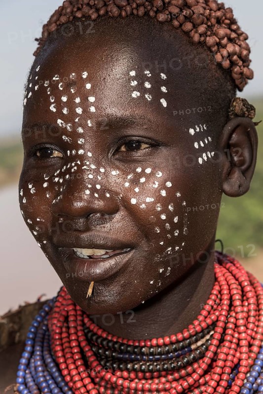 Young woman with face painting
