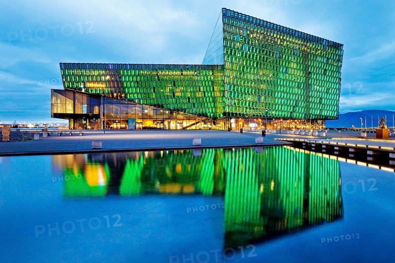 Illuminated Harpa Concert Hall at dusk