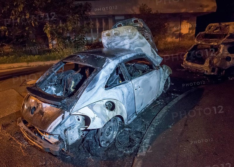 Burnt out VW Beetle after accident