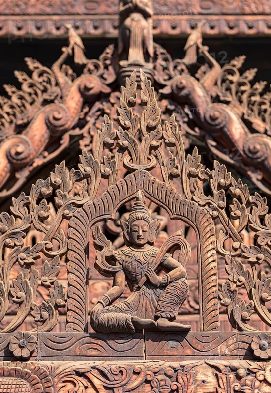 Teak-wood carvings at Nat Taung Kyaung