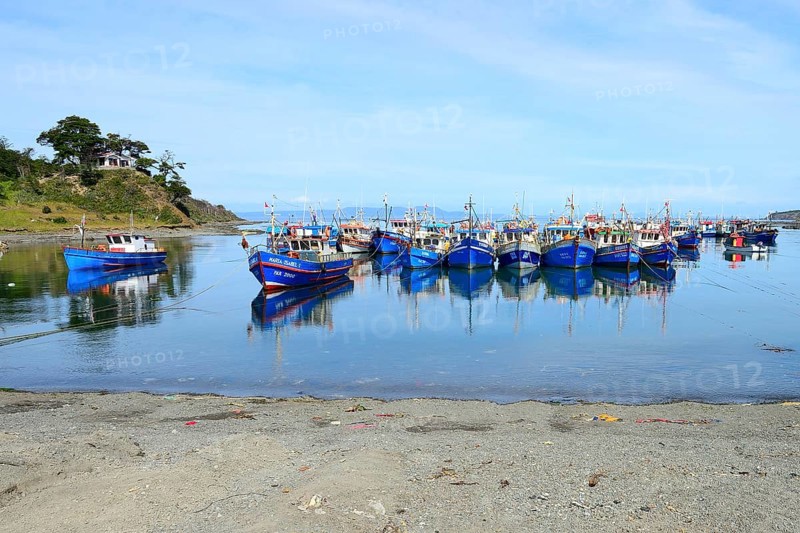 Fishing boats in the bay of Puerto del Hambre