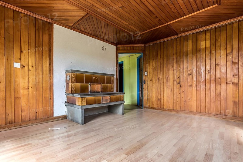 Tiled stove in an empty house