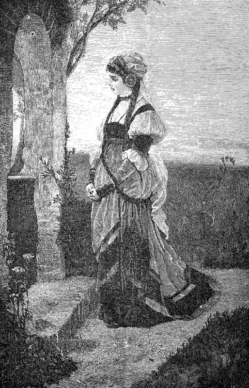 Woman stands in front of a small field chapel and prays