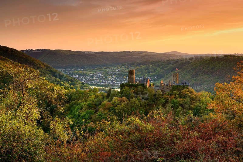 View of Thurant Castle in the Moselle Valley at sunset in autumn
