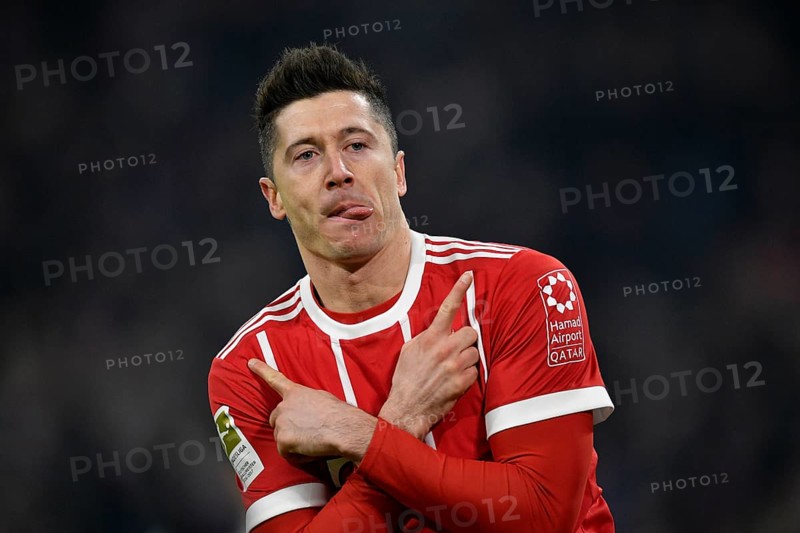 Typical celebration with crossed arms and tongue