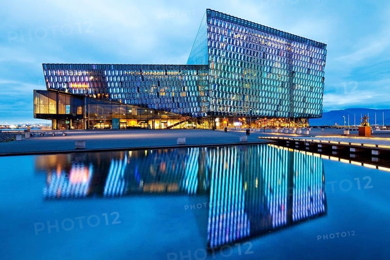 Illuminated Harpa Concert Hall at dusk