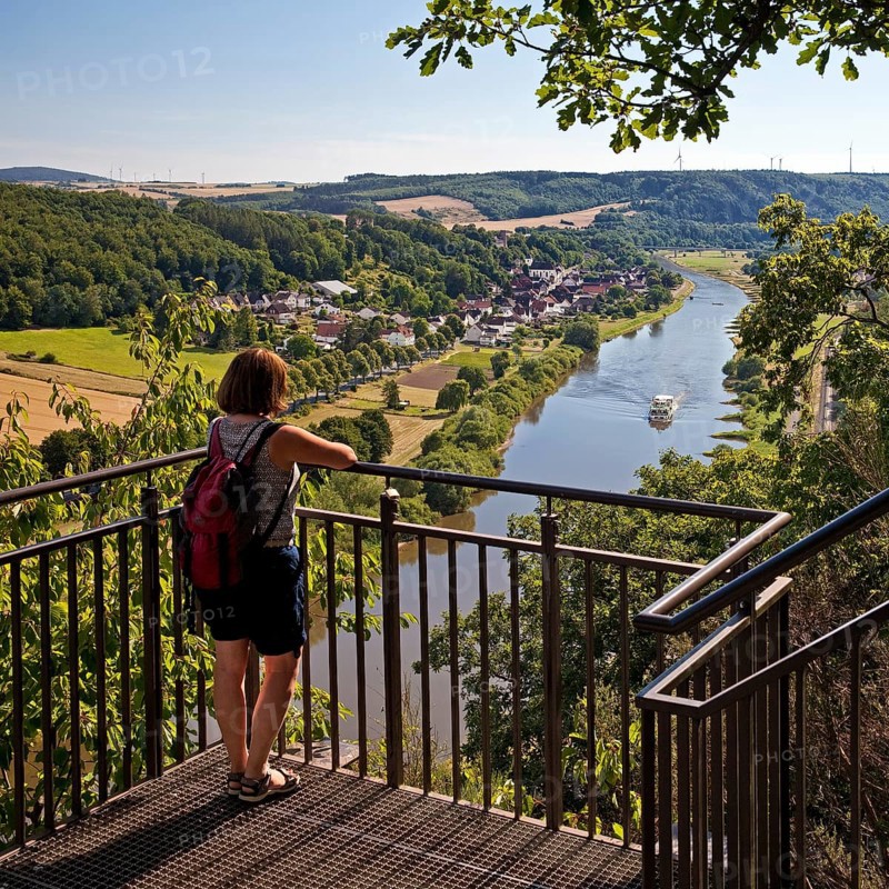 Woman looks from the Skywalk on the Weser