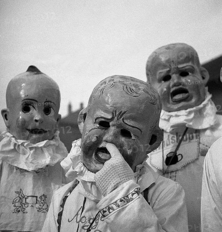 People with baby masks
