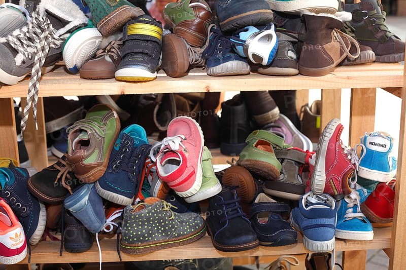 Children's shoes in a shelf