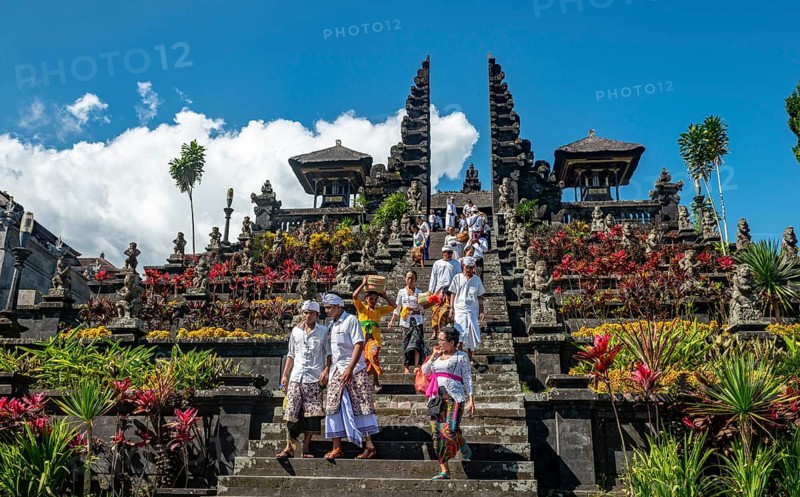 Devout Balinese descend stairs