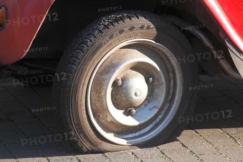 Flat tire on vintage car