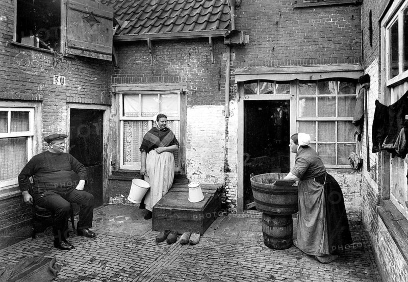 Washing laundry in the courtyard ca. 1930