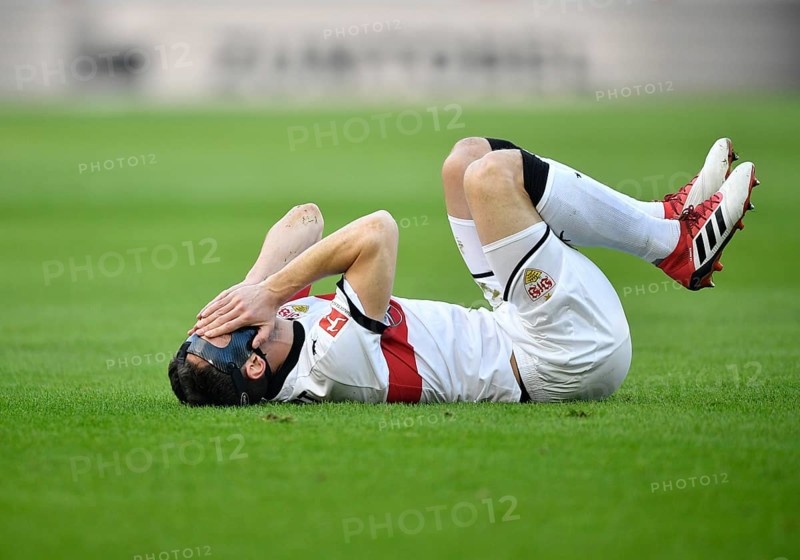 Christian Gentner of VfB Stuttgart lying injured on the ground