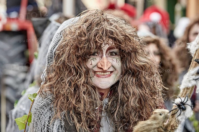 Woman disguised as witche at the Mohnenumzug