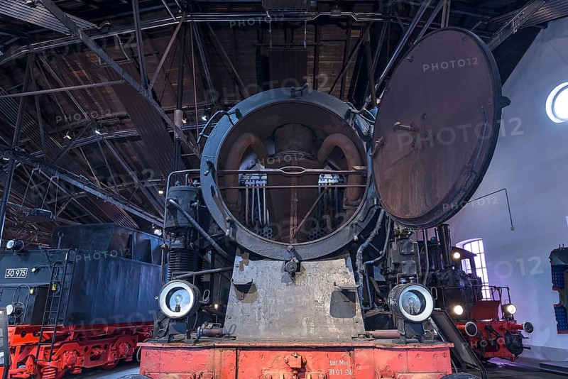 Tender locomotive 95 016 with open smoke chamber in a former railway depot