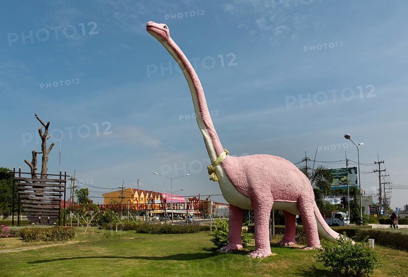 Dinosaur figure at the entrance of the village