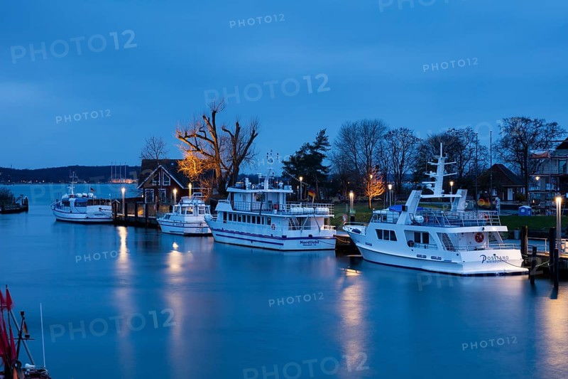 Baltic Sea harbour with boats at dusk