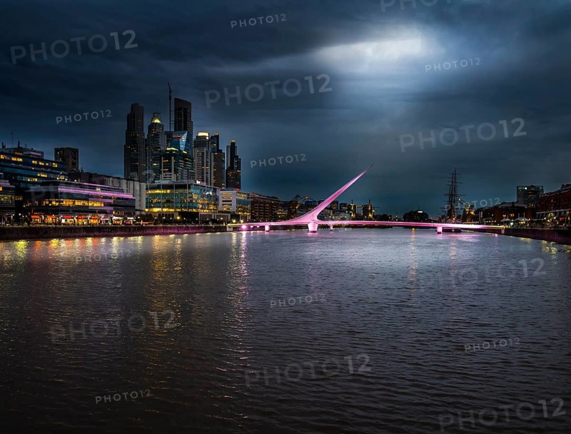 High-rise buildings at the South Dock with bridge Puente de la Mujer over the river Rio de la Plata