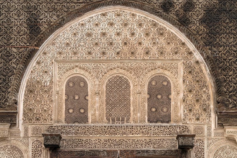 Artful carved decorations over a gate