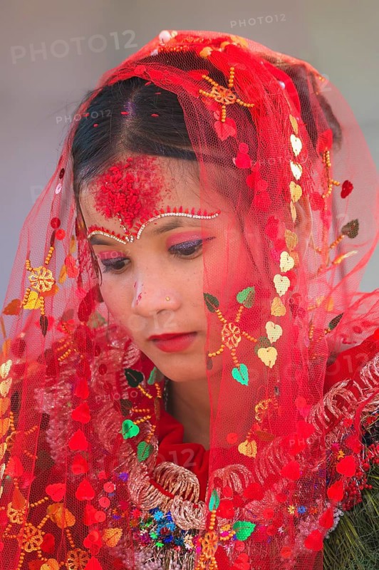 Nepalese bride from the Tharu ethnic group in traditional attire