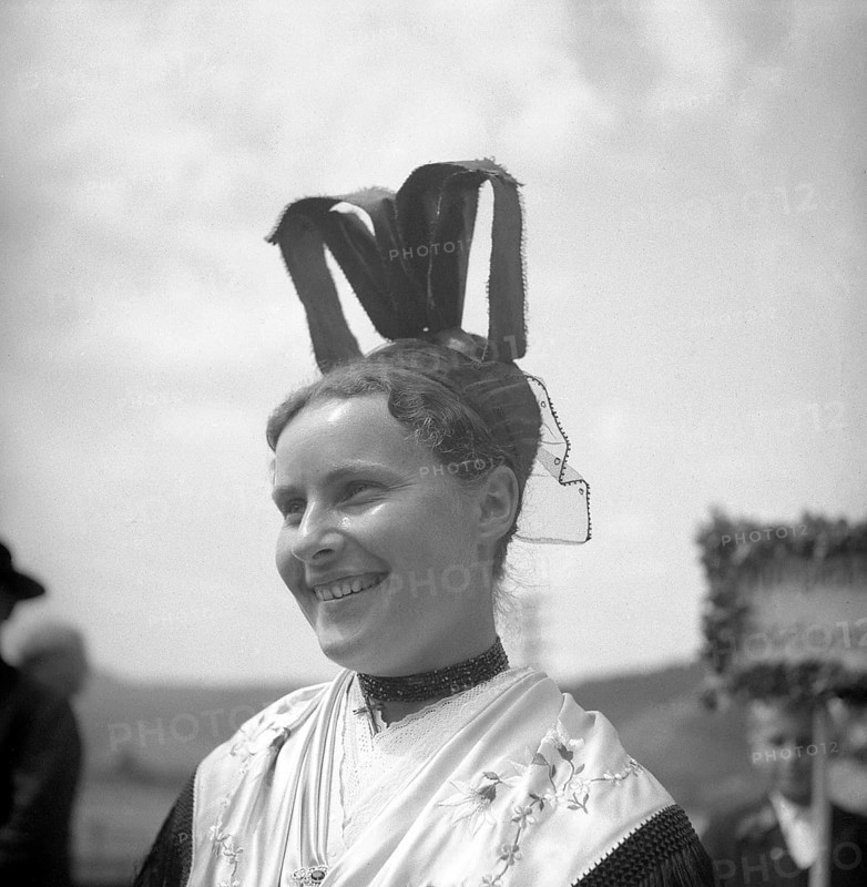 Woman in traditional traditional costume with hat