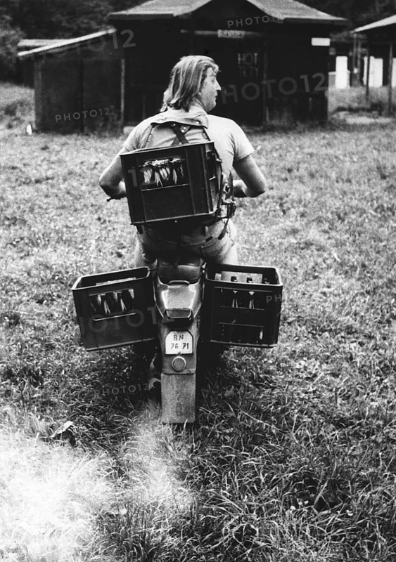 Beer crates transported by moped ca. 1970s