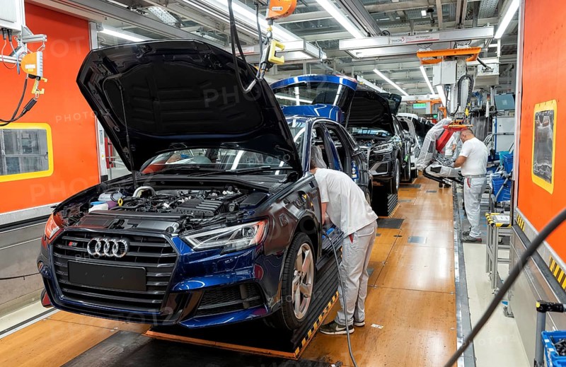 Installation of the front seats on the assembly line of the Audi A3 at the Audi AG plant in Ingolstadt